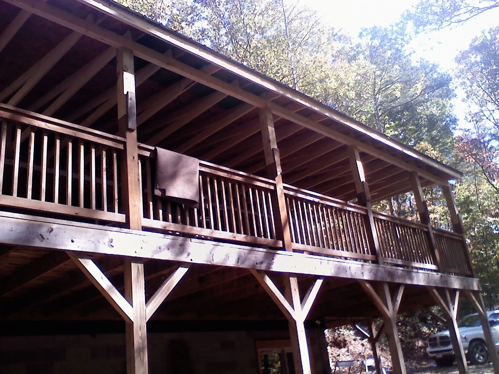 Timber framing under a new elevated porch and deck in Pittstown